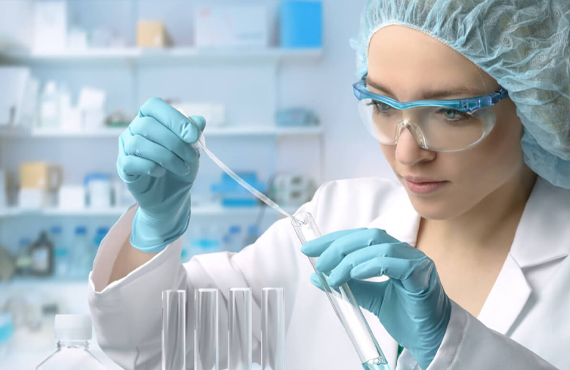 three clear beakers placed on tabletop