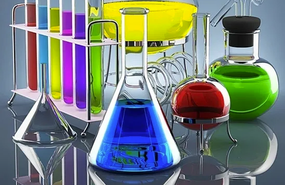 three clear beakers placed on tabletop
