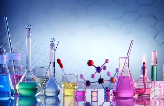 three clear beakers placed on tabletop