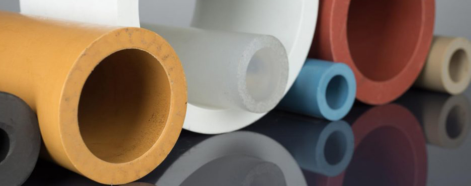 three clear beakers placed on tabletop